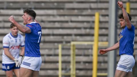 Conor Brady and Oisin Kiernan celebrate after Padraig Faulkner scored Cavan's first goal at Clones