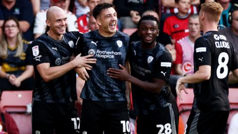 Jordan Hugill celebrates his late equaliser