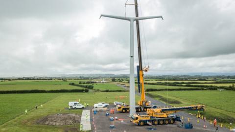 T Pylon being erected