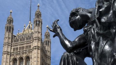 One of the bronze Burghers of Calais by Auguste Rodin, commemorating the Siege of Calais in 1347, in the Victoria Tower Gardens, Houses of Parliament, London, SW1, England