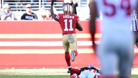 Marquise Goodwin races away to score