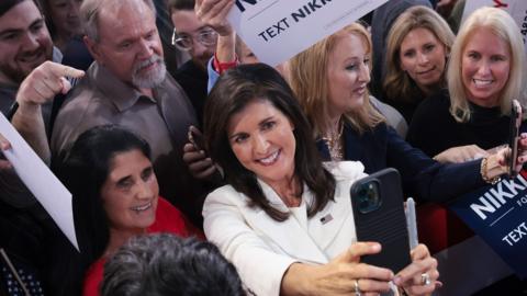 Nikki Haley snaps a selfie with supporters