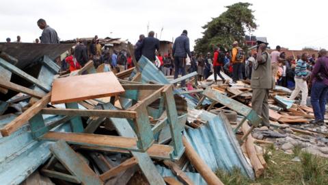 The debris of a collapsed school classroom in Nairobi, Kenya