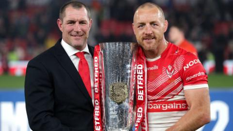 St Helens coach Kristian Woolf and captain James Roby with the Super League trophy