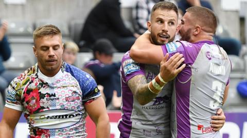 Hull KR pair Ben Crooks and Greg Minikin celebrate a try against Leigh Centurions