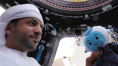 Astronaut Sultan Al Neyadi with his mascot Suhail on the International Space Station