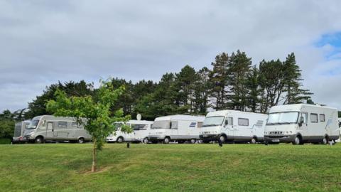 Campervans parked in a row