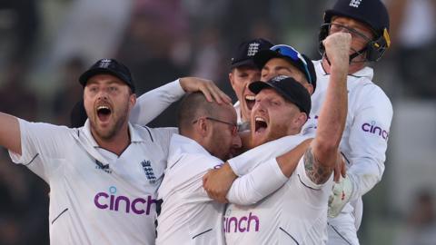 England's players celebrate first Test victory over Pakistan