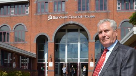 Cllr Steve Eling in front of Sandwell Council house