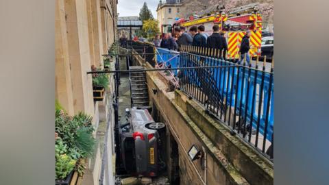 The car wedged against the Francis Hotel