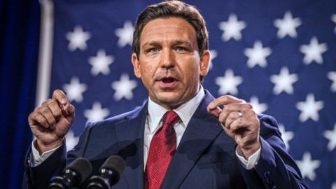 DeSantis speaks to a crowd gathered in Florida