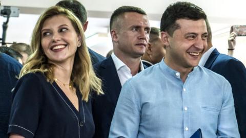 Ukrainian President Volodymyr Zelensky (R) alongside his wife Olena in Kiev, 21 July 2019