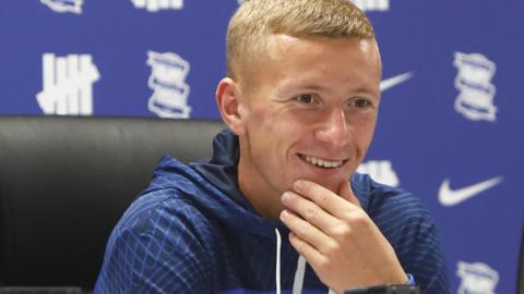 Jay Stansfield smiles at his post-match press conference after his injury-time winner for Birmingham against Plymouth Argyle