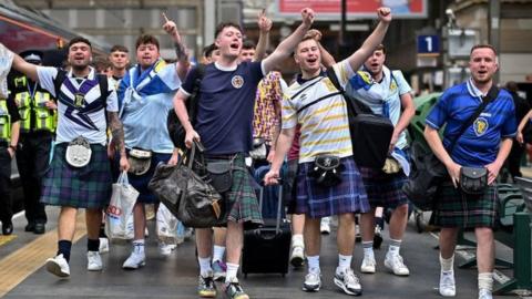 Scotland fans leaving Glasgow