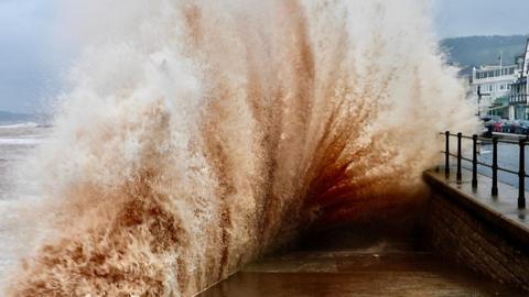Waves crashing against the coast
