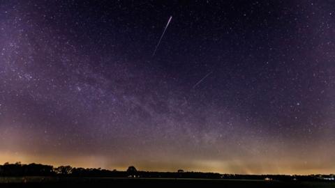 A meteor of the lyrids in the sky is seen on 22 April, 2020 in Schermbeck, Germany