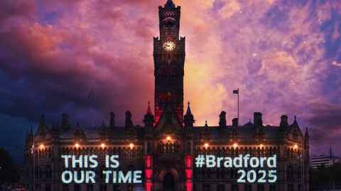 A City of Culture banner projected on to Bradford City Hall