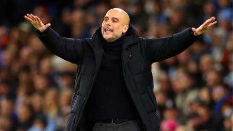 Pep Guardiola holds out his arms