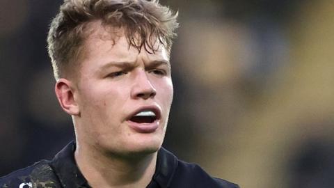 Northampton Saints fly-half Fin Smith