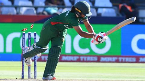 Bangladesh's Sobhana Mostary is bowled by New Zealand's Hannah Rowe (not seen) during the Group A T20 women's World Cup cricket match between New Zealand and Bangladesh at Newlands Stadium