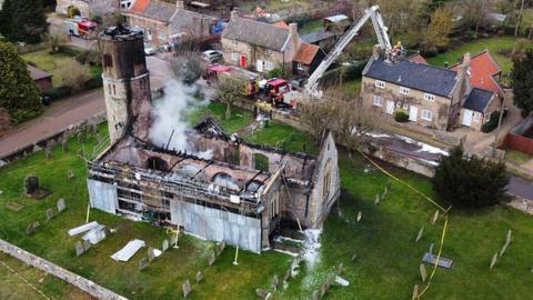 Aerial view of fire-ravaged Beachamwell church