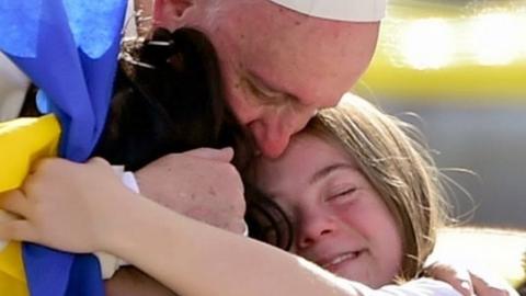 Pope Francis hugs young faithful in Morelia, Mexico. Photo: 16 February 2016