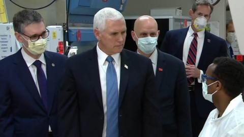 Mr Pence was the only person in the room not wearing a mask, video shows