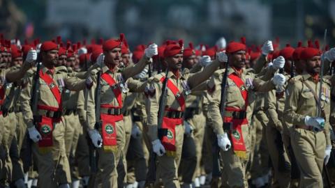 Pakistani soldiers march past during the Pakistan Day military parade in Islamabad on March 23, 2018. Pa