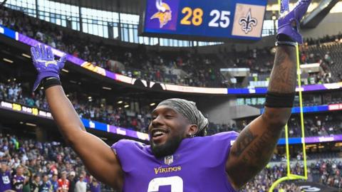 Alexander Mattison celebrates