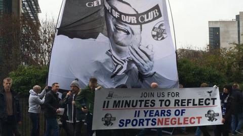 Newcastle United fans protesting outside St James' Park