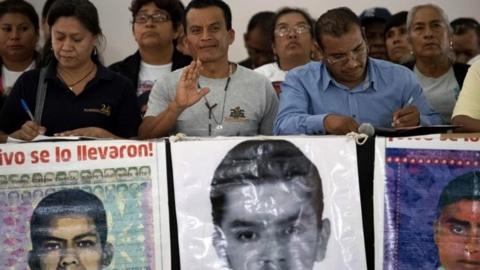 Relatives of some of the 43 missing students of Ayotzinapa, offer a press conference after meeting with Mexican President Andres Manuel Lopez Obrador, in Mexico City, on September 11, 2019