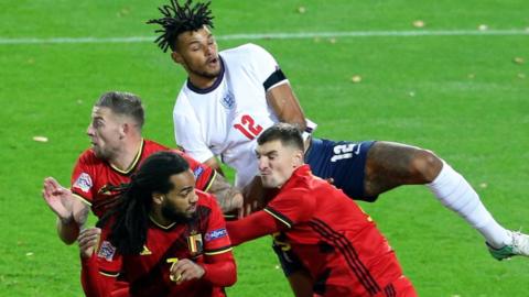 England's Tyrone Mings challenges