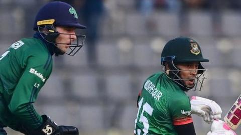 Mushfiqur Rahim in action for Bangladesh as Ireland wicket-keeper Lorcan Tucker looks on