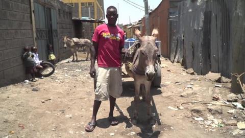 Anthony Maupe Wanyama with his rented donkey