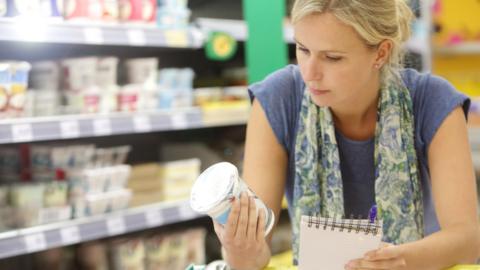 Woman shopping in supermarket