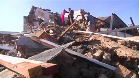 The rubble of a building razed by an airstrike