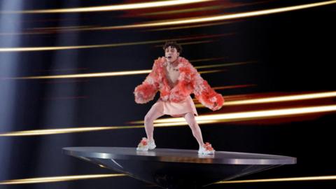 Nemo sings at the Eurovision Song Contest