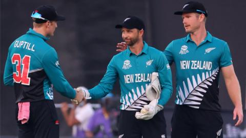 New Zealand players celebrate beating Namibia