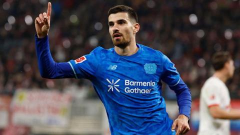 Martin Terrier celebrates scoring for Bayer Leverkusen