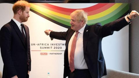 Prince Harry meeting Boris Johnson at an investment summit in London