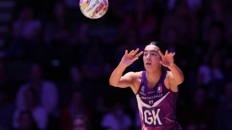Alice Harvey throws the ball