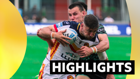 Tommy Makinson of Catalans is tackled by Innes Senior of Leigh