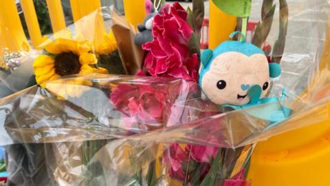 Floral tributes left at the scene of a fatal collision at the junction of Harbour Street and Cromwell Road, Whitstable.