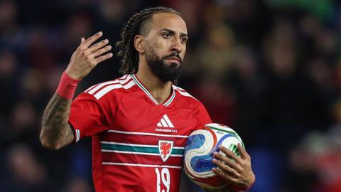 Wales' Sorba Thomas celebrates