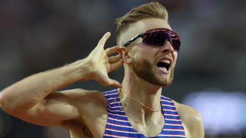 Great Britain's Josh Kerr celebrates winning World Championship 1500m gold in 2023