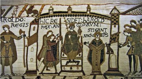 Part of the Bayeux Tapestry, showing Harold being crowned King of England, before he was killed at the Battle of Hastings