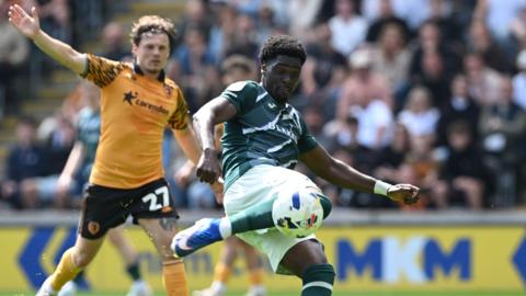 Mohamed Toure opens the scoring for Norwich City to deal a blow to Hull City's play-off hopes.