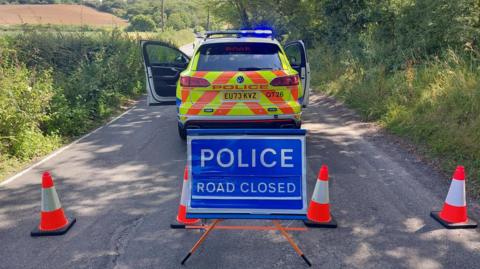 A police cordon in Botney Hill Road