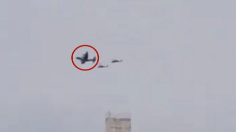 Three aircraft are seen in a blurry screengrab.
