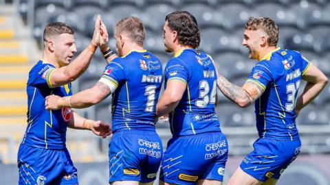 Warrington celebrate against Hull FC